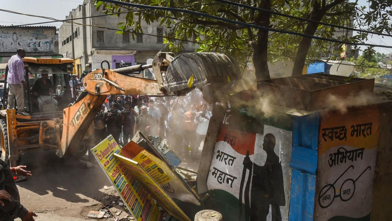 Illegal structures during a joint anti-encroachment drive by NDMC, PWD, local bodies and the police, in the violence-hit Jahangirpuri area, in New Delhi. Credit: PTI Photo