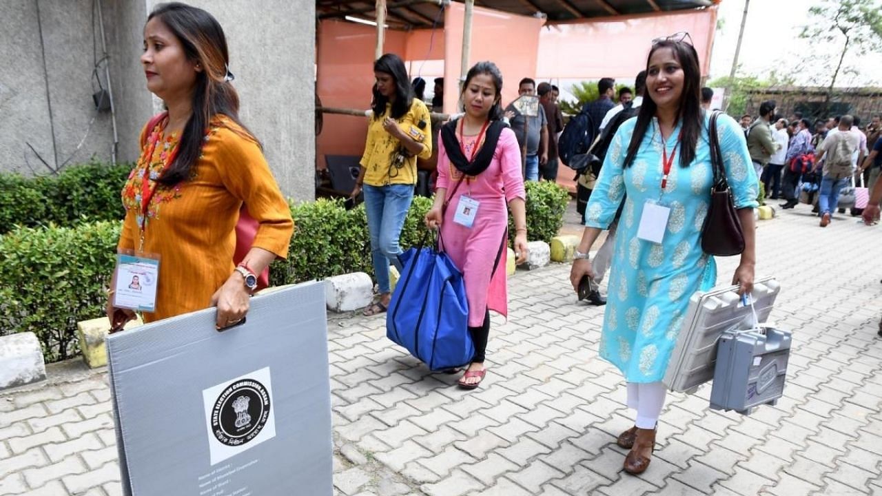 Polling officials collect EVMs and other voting materials from a distribution centre ahead of the Guwahati Municipal Corporation (GMC) elections. Credit: IANS Photo