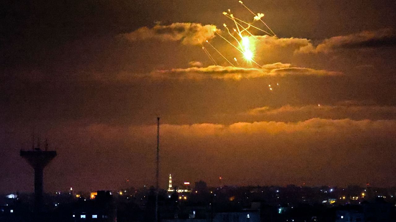Palestinian militants fired volleys of rockets from Gaza into Israel, which responded with air strikes in the early hours in the biggest escalation since an 11-day war last year. Credit: AFP Photo