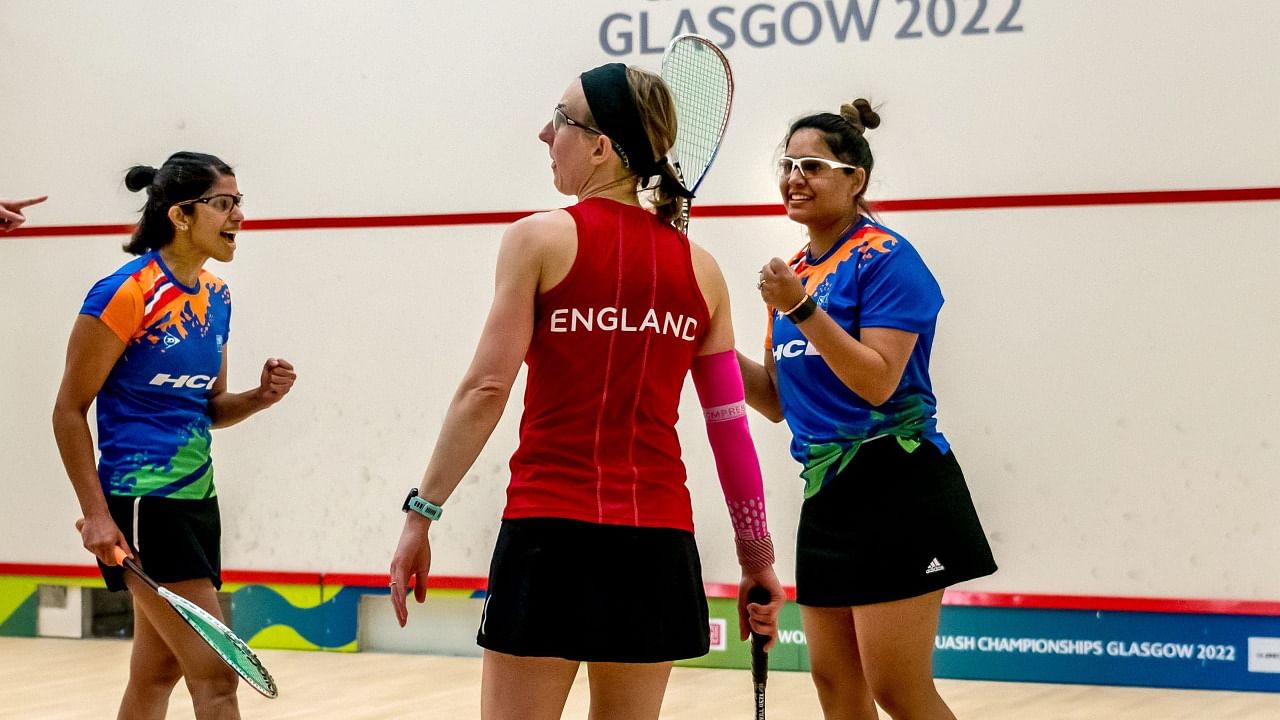 India's Dipika Pallikal (R) and Joshna Chinappa celebrate after defeating England 2-1 in the women's doubles finals of 2022 WSF World Doubles Squash Championships, in Glasgow, Scotland.