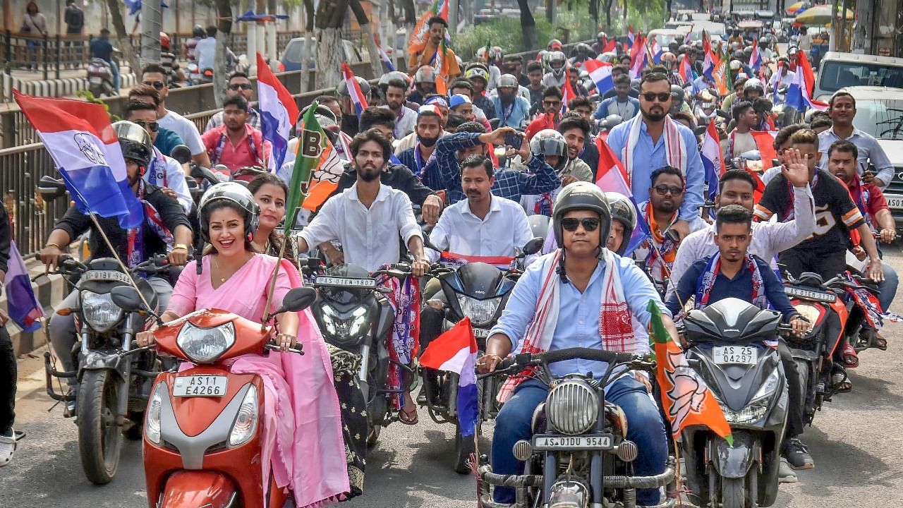 BJP and Asom Gana Parishad (AGP) supporters take out a bike rally in Assam. Credit: PTI Photo