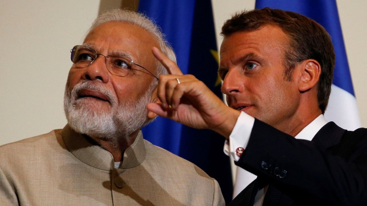 Modi with Macron in 2019. Credit: AP/PTI File Photo