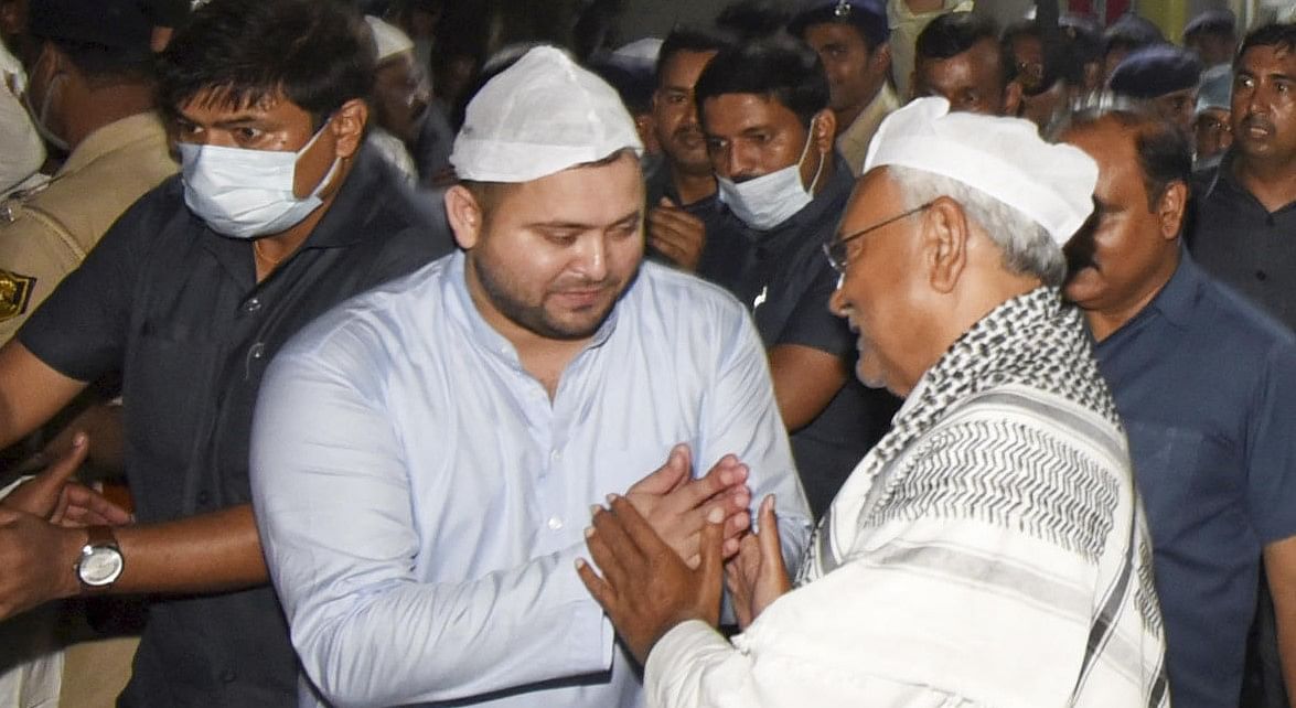 Bihar Chief Minister Nitish Kumar with RJD leader Tejashwi Yadav at an Iftar party. Credit: PTI