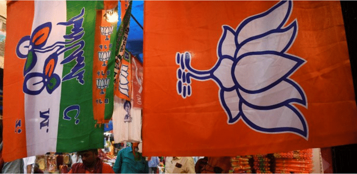 TMC and BJP party flags. Credit: AFP Photo