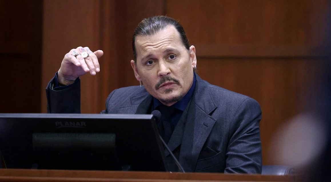 FILE PHOTO: US actor Johnny Depp testifies during the 50 million US dollar Depp vs Heard defamation trial at the Fairfax County Circuit Court in Fairfax, Virginia, U.S. Credit: Reuters