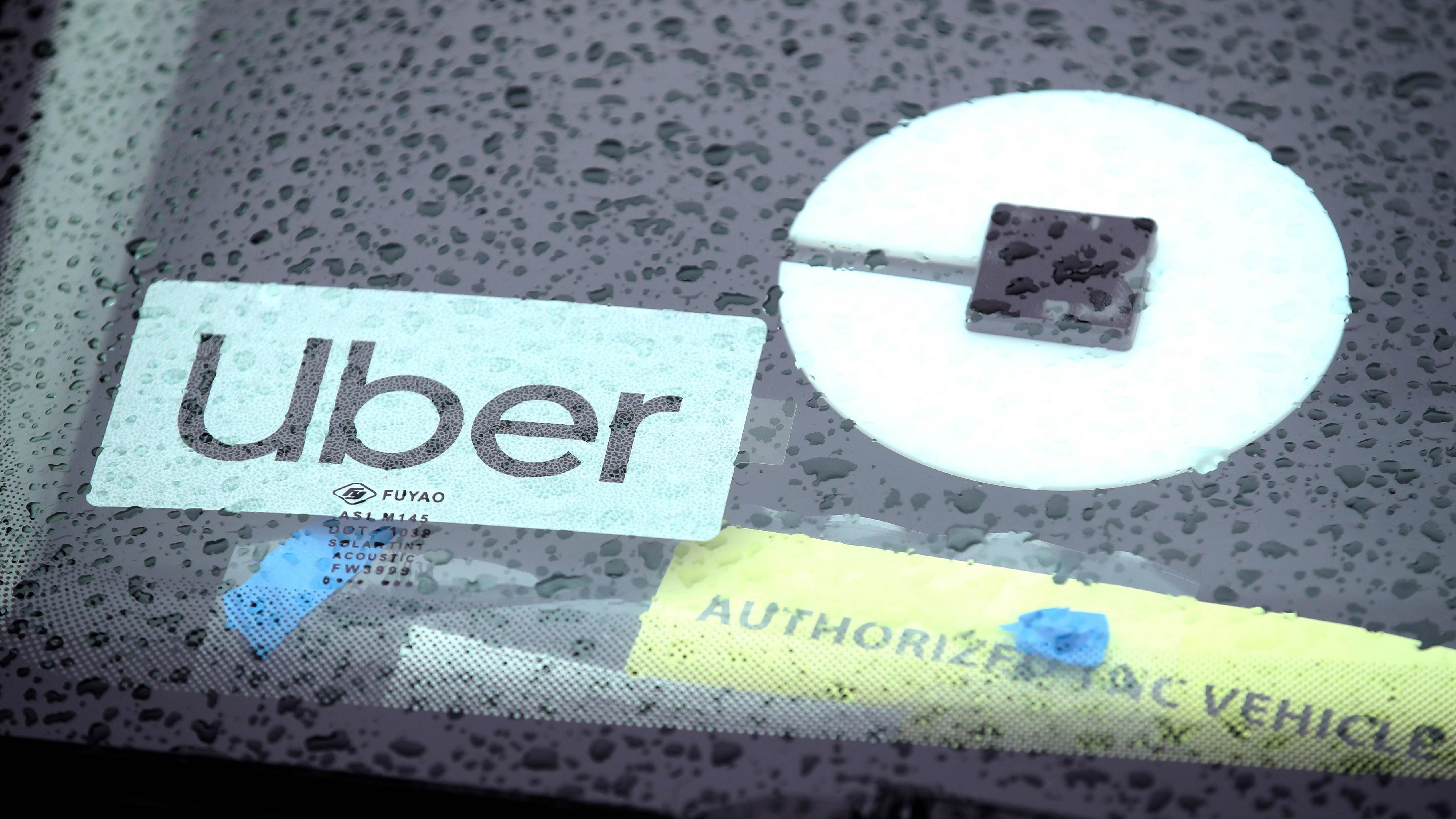 Uber now faces $26 million (Australian dollars) in penalties for adopting those illegal practices. Credit: AFP Photo