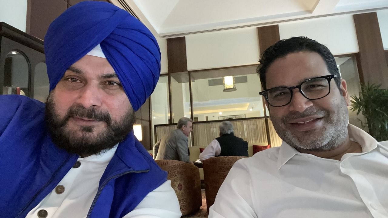 Punjab Congress chief Navjot Singh Sidhu and poll strategist Prashant Kishor. Credit: Twitter/@sherryontopp