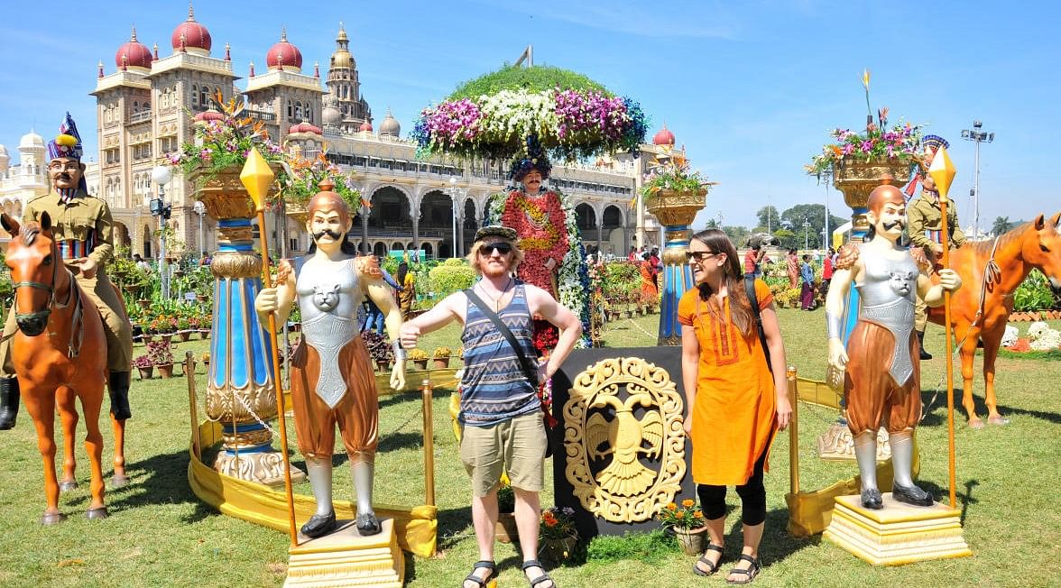 Foreigners visit during the inauguration of Flower Show at Amba Vilas Palace in Mysuru on Thursday. Credit: DH Photo/ Prashanth HG
