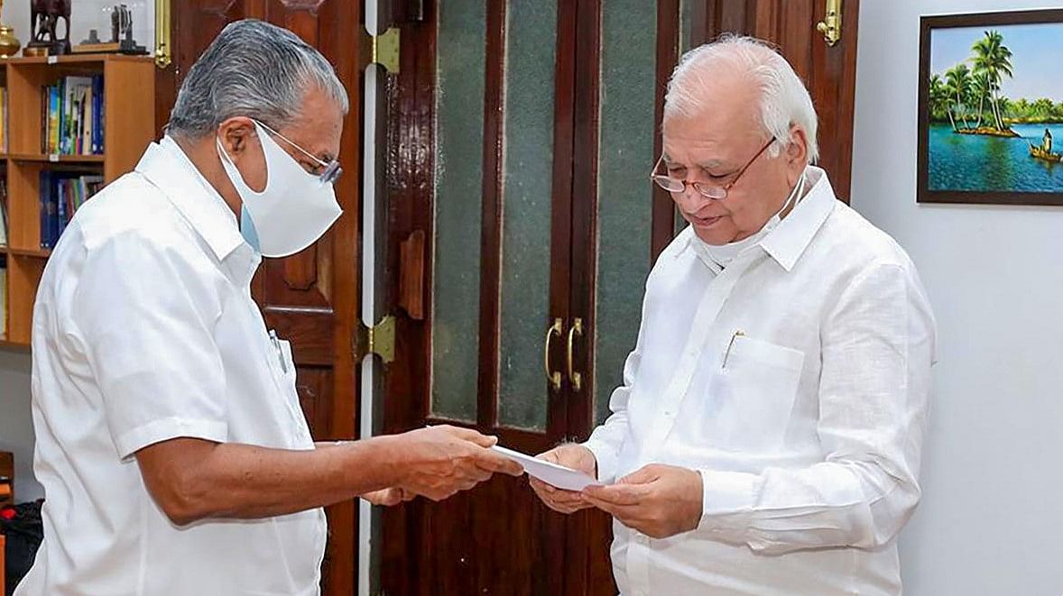 Kerala CM Pinarayi Vijayan with Governor Arif Mohammed Khan. Picture Credit: PTI