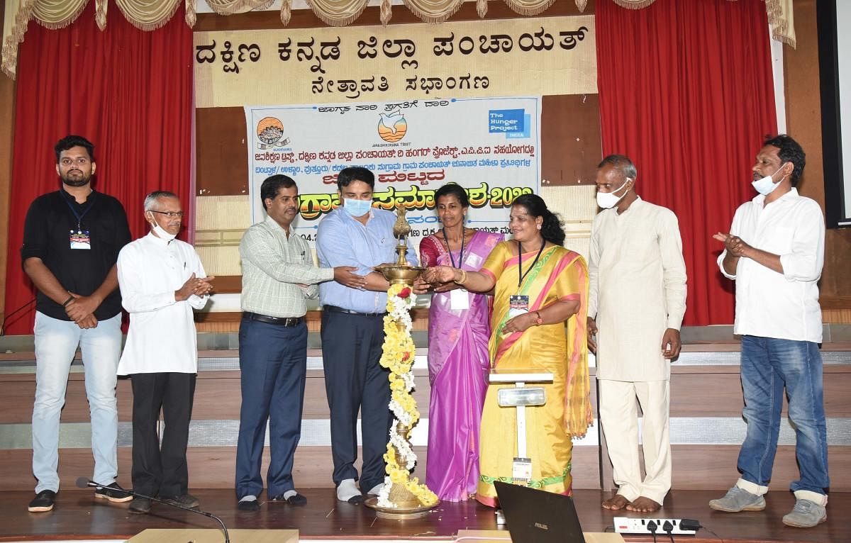 Deputy Commissioner Dr Rajendra K V inaugurates the district-level Sugrama convention at Zilla Panchayat Hall in Mangaluru.