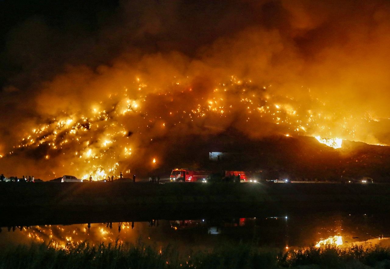 A massive fire which broke out at the Bhalswa landfill site in north Delhi. Credit: PTI Photo