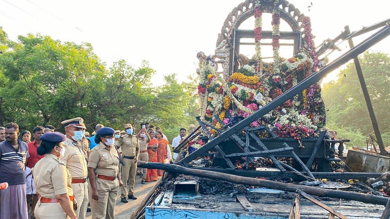 Mangled remains of the chariot after several people were electrocuted during a chariot procession, in Kalimedu area of Thanjavur district. Credit: PTI Photo