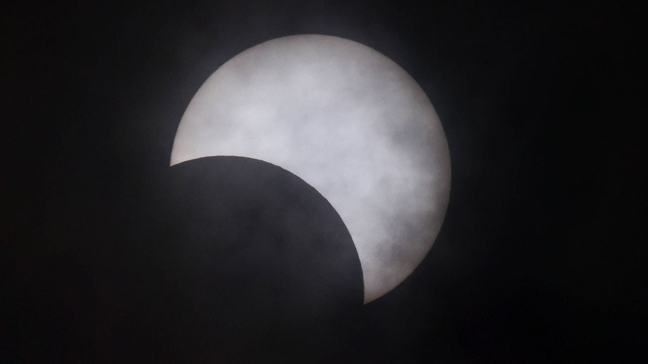 A file photo of a partial solar eclipse seen from Bengaluru. Credit: DH Photo