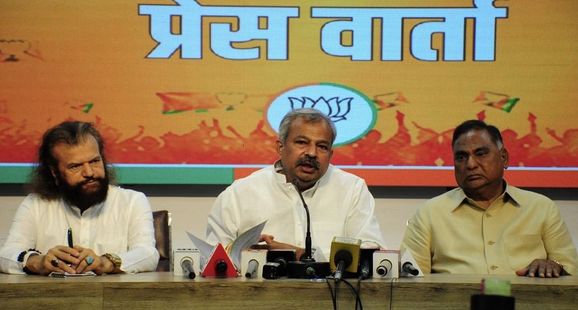 File Photo of Delhi BJP President Adesh Gupta along with LOP Ramvir Singh Bidhuri and MP Hansraj Hans address a press conference on Jahangirpuri violence in New Delhi. Credit: IANS