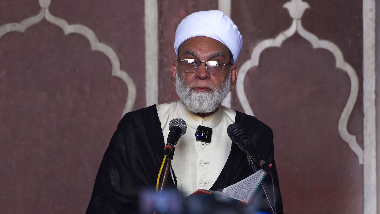 Shahi Imam Syed Ahmed Bukhari speaks during the 'Alvida Namaz' on the last Friday of the holy month of Ramadan, at Jama Masjid. Credit: PTI Photo