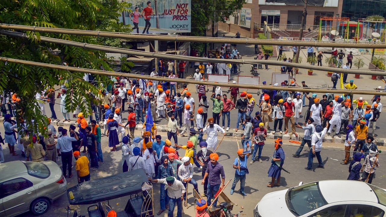 Nihangs gather after a clash between followers of Shiv Sena and pro-Khalistani Sikh organisations, near Kali Mata Mandir in Patiala. Credit: PTI File Photo