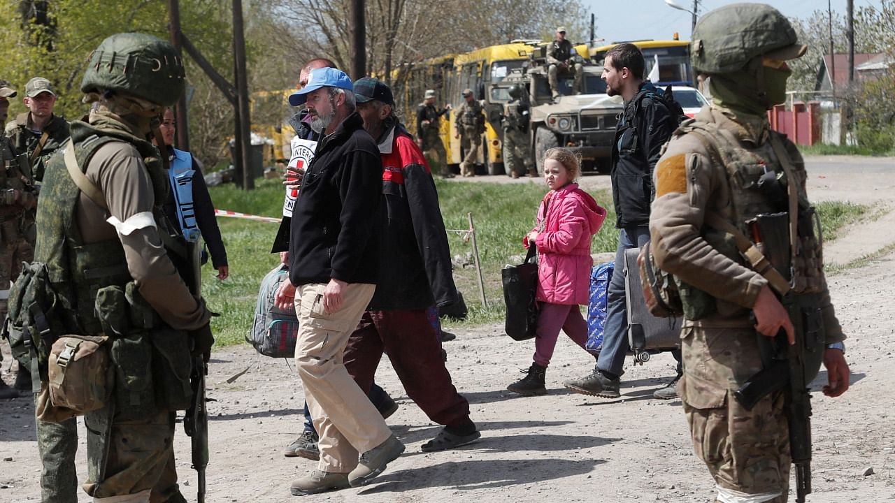 Evacuees who left the area near Azovstal steel plant in Mariupol, arrive at a temporary accommodation centre. Credit: Reuters Photo