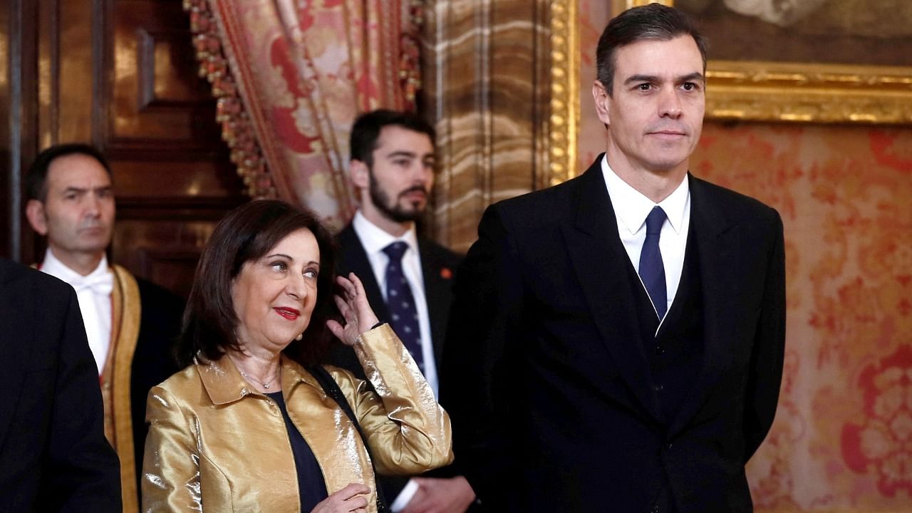 Prime Minister Pedro Sanchez (R) and Defence Minister Margarita Robles. Credit: AFP Photo