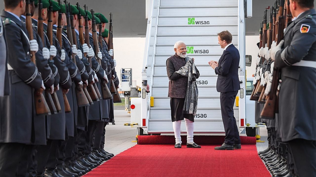 Prime Minister Narendra Modi being welcomed on his arrival in Berlin. Credit: PTI Photo