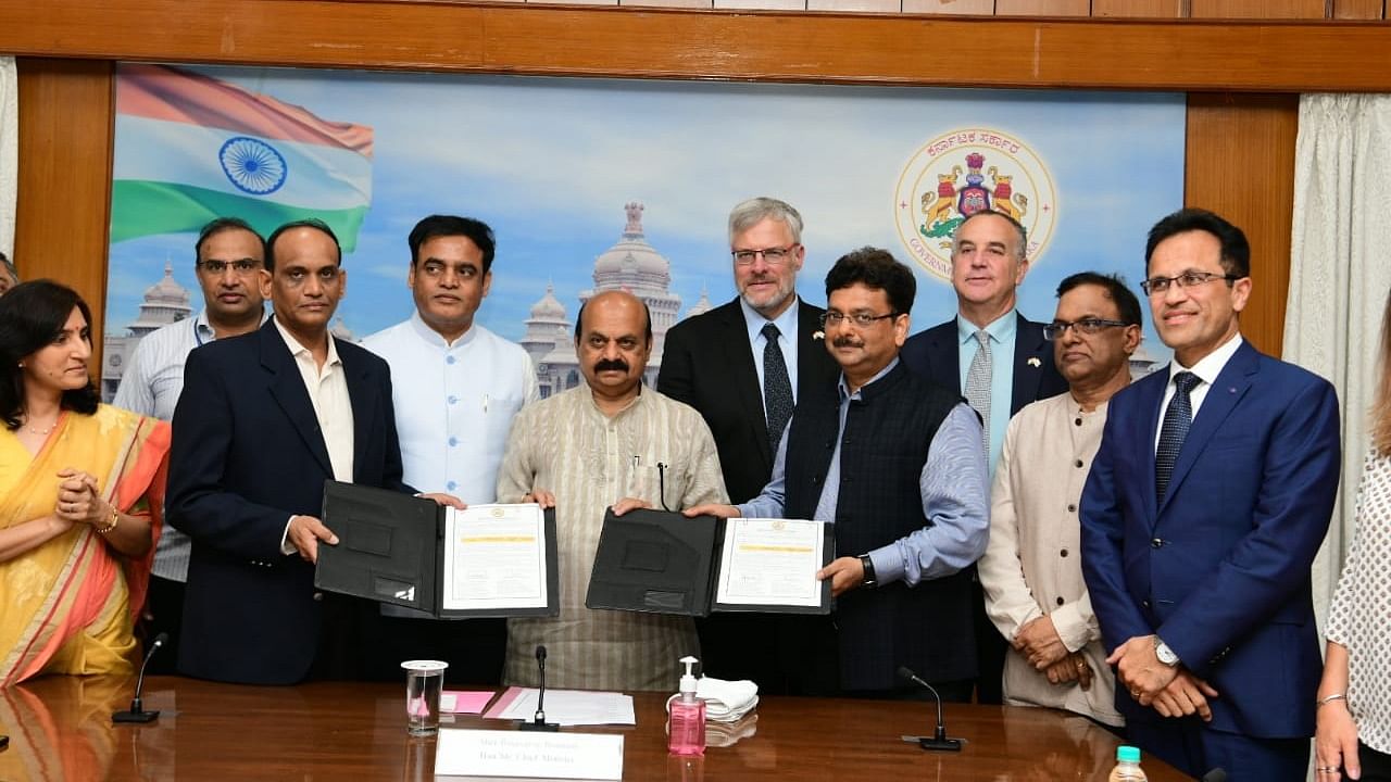 Karnataka CM Basavaraj Bommai (C) during of a signing of MoU between the state government and ISMC in Bengaluru. Credit: DH Photo/S K Dinesh