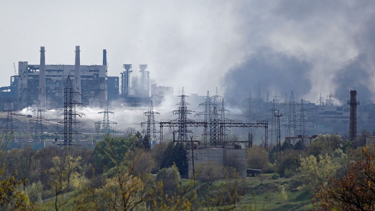 Smoke rises above a plant of Azovstal Iron and Steel Works during Ukraine-Russia conflict in the southern port city of Mariupol. Credit: Reuters Photo