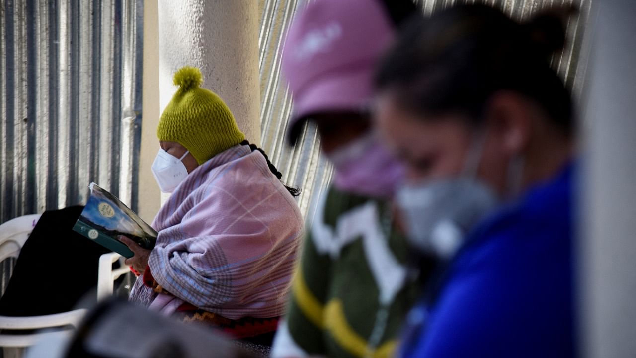 Inmates read books in the prison where they have access to a small library as part of a program that aims to spread literacy and offer the chance to get out of jail earlier, in La Paz. Credit: Reuters Photo