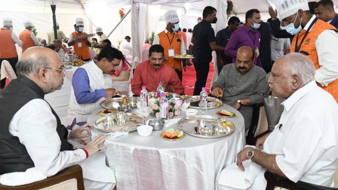 Union Minister for Home Amit Shah seen with former chief minister B S Yediyurappa, Chief Minister Basavaraj Bommai, state BJP president Nalin Kumar Kateel and Union Minister Pralhad Joshi during a lunch with party leaders in Bengaluru. Credit: DH Photo