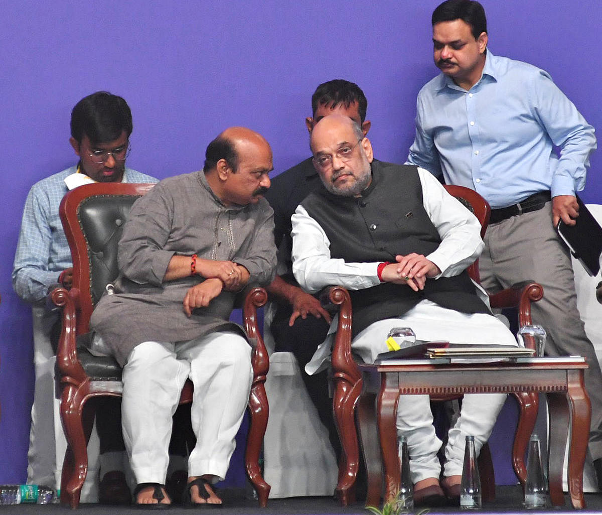 Union Home Minister Amit Shah and Chief Minister Basavaraj Bommai during the closing ceremony of Khelo India University Games in Bengaluru on Tuesday. DH PHOTO/PUSHKAR V