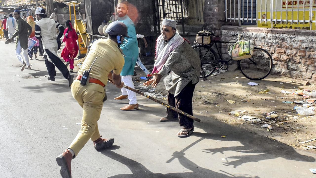 Police resort to baton charge after clashes broke out between two communities on Eid-ul-Fitr, in Jalori Gate area, in Jodhpur. Credit: PTI Photo