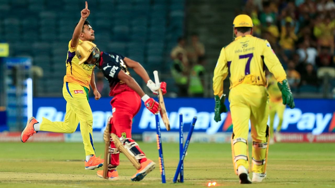 Maheesh Theekshana of Chennai Super Kings celebrates the wicket of Shahbaz Ahmed of Royal Challengers Bangalore. Credit: PTI Photo