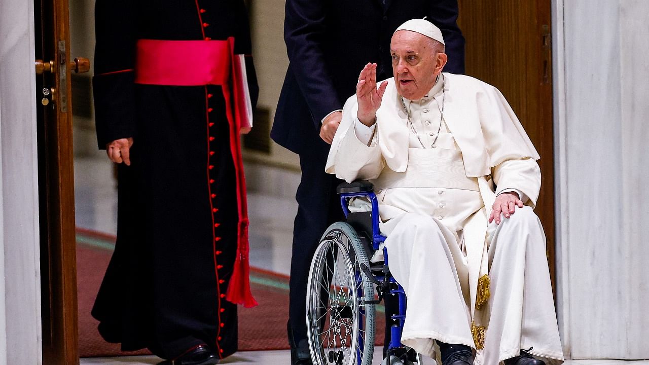 Pope Francis arrives on a wheelchair to meet with participants in the plenary assembly of the International Union of Superiors General (IUSG) at the Vatican. Credit: Reuters Photo