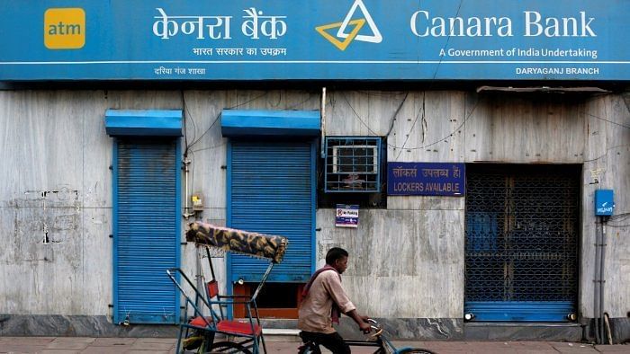 Shares of Canara Bank were trading at Rs 214.05 apiece on BSE, down by 4.72 per cent from previous close. Credit: Reuters Photo