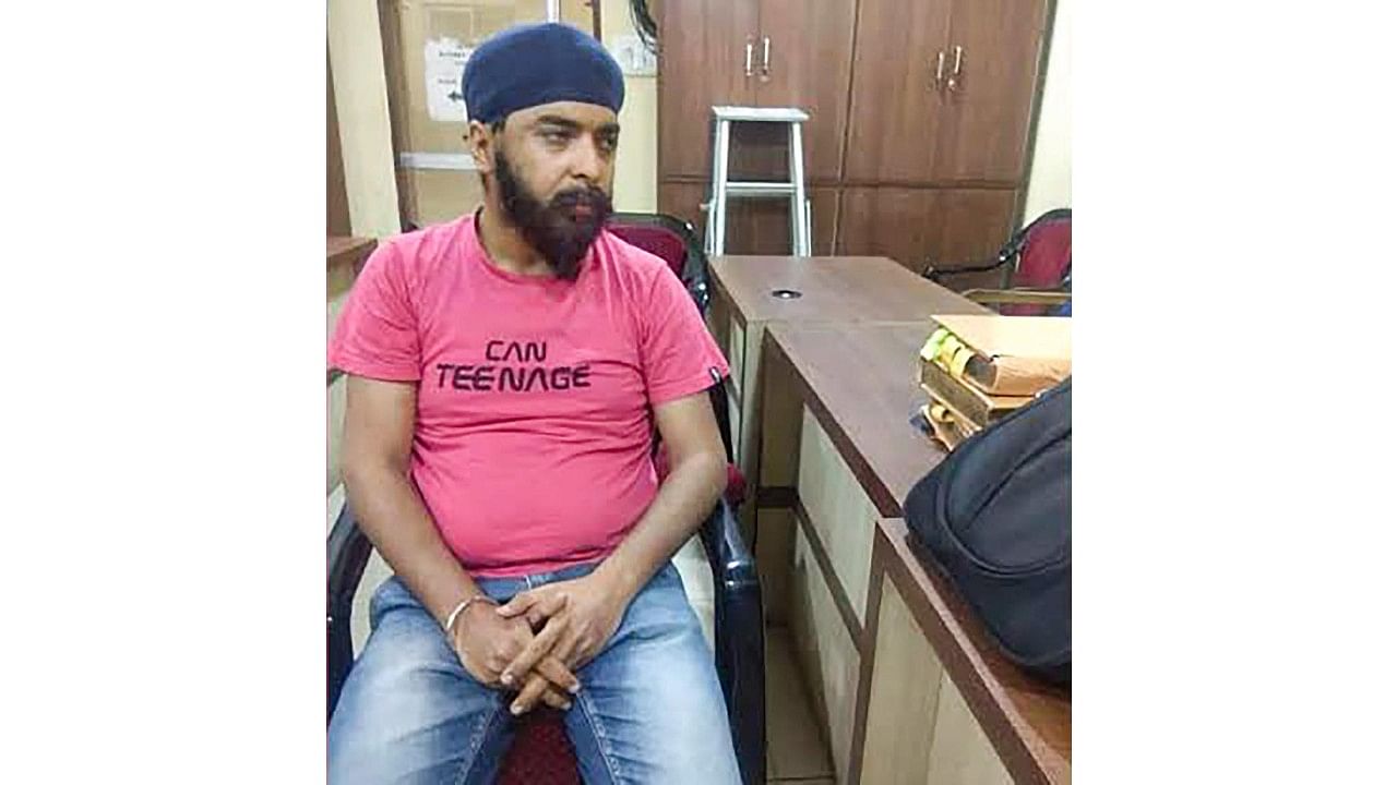 Punjab Police arrested Delhi BJP spokesperson Tajinder Pal Singh Bagga from his residence in Delhi in connection with a case registered against him in Mohali last month. Credit: PTI Photo