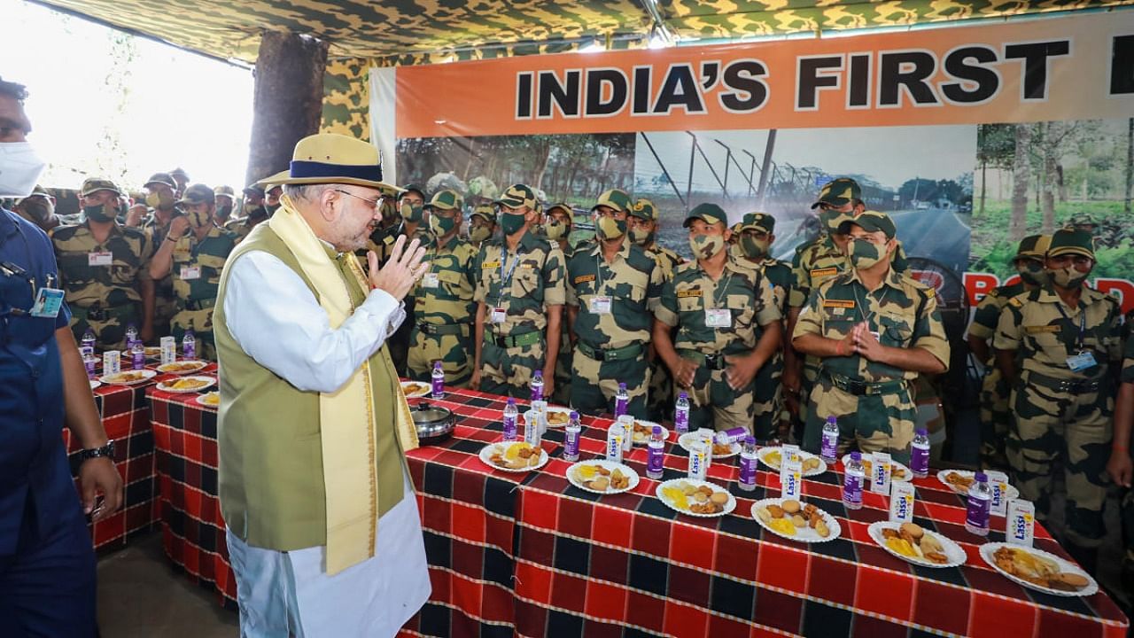 Union Home Minister Amit Shah visits the Jikabari BOP in West Bengal and interacts with the BSF personnel. Credit: PTI Photo