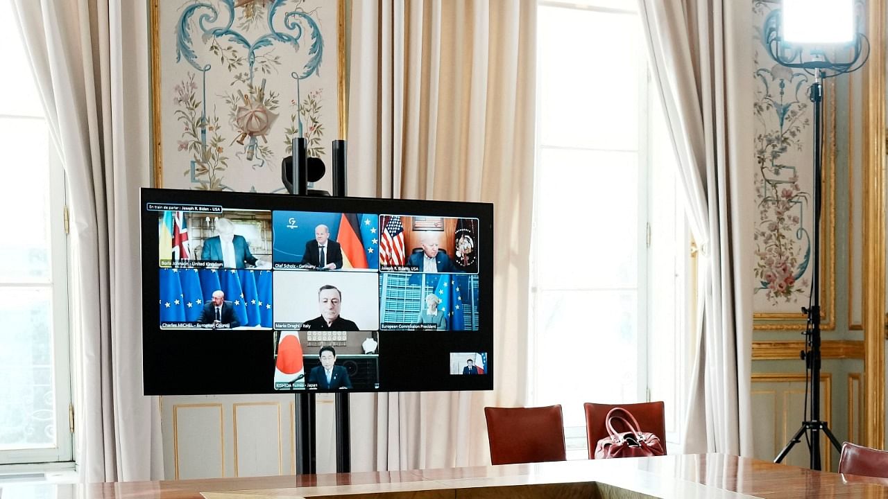 A photograph shows a general view of the video screen of G7 leaders during a video-conference on Ukraine with France's President at the Elysee Palace in Paris. Credit: AFP Photo