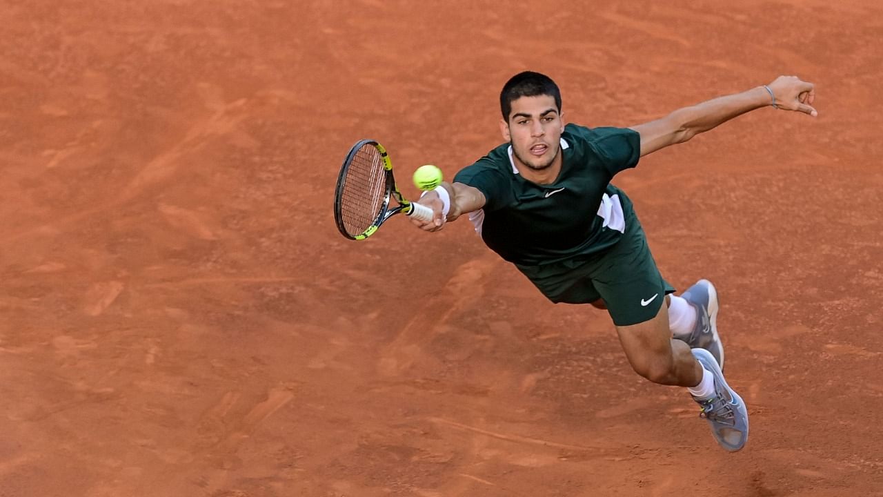 Madrid Open winner Carlos Alcaraz. Credit: AFP File Photo