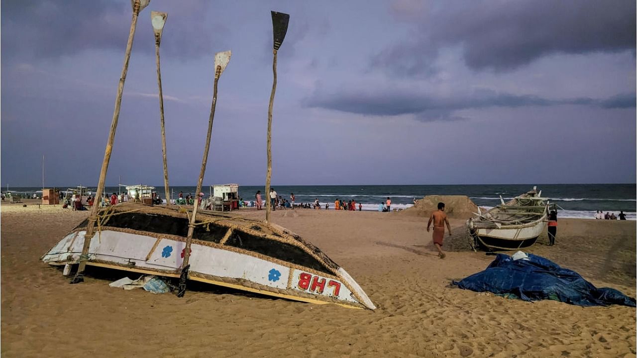 Anchored boats on the shore after India Meteorological Department issued an alert for coastal states regarding Cyclone Asani, in Puri district, Sunday, May 8, 2022. Credit: PTI Photo