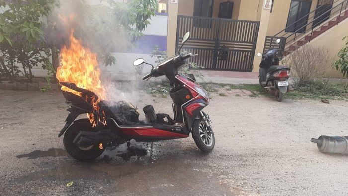 A view of the scooter on fire in Hosur. Credit: Special arrangement