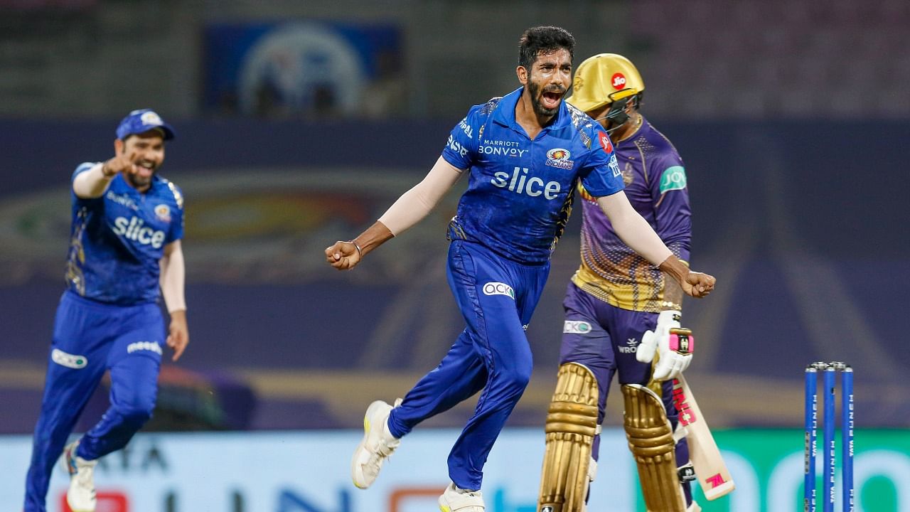 Bumrah's 5-10 from four overs helped Mumbai restrict Kolkata to 165-9. Credit: PTI Photo