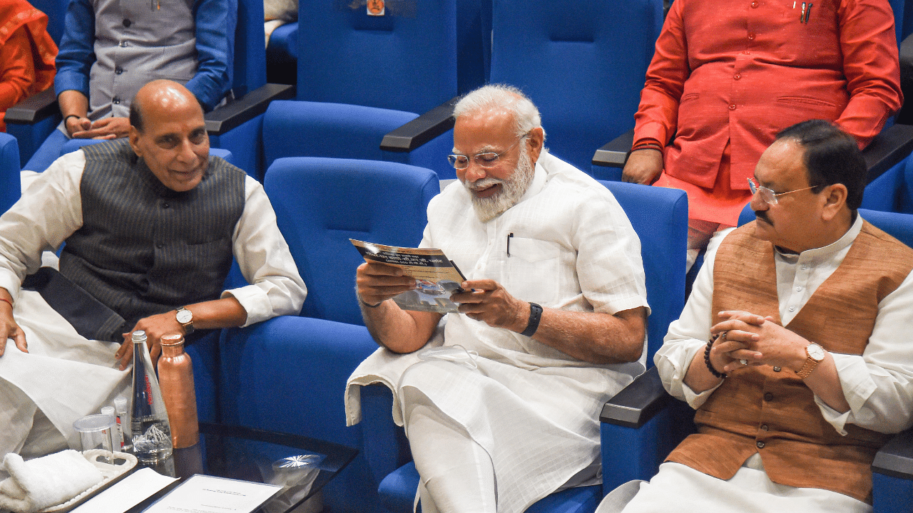 Prime Minister Narendra Modi with Union Defence Minister Rajnath Singh and BJP National President JP Nadda. Credit: PTI Photo