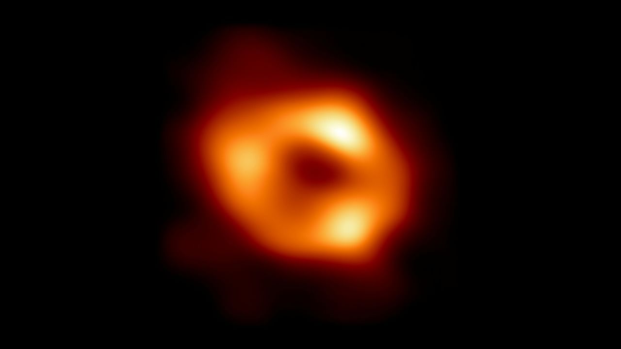 The image thus depicts not the black hole itself, because it is completely dark, but the glowing gas that encircles the phenomenon -- which is four million times more massive than our Sun -- in a bright ring of bending light. Credit: EHT Collaboration/National Science Foundation/Handout via REUTERS