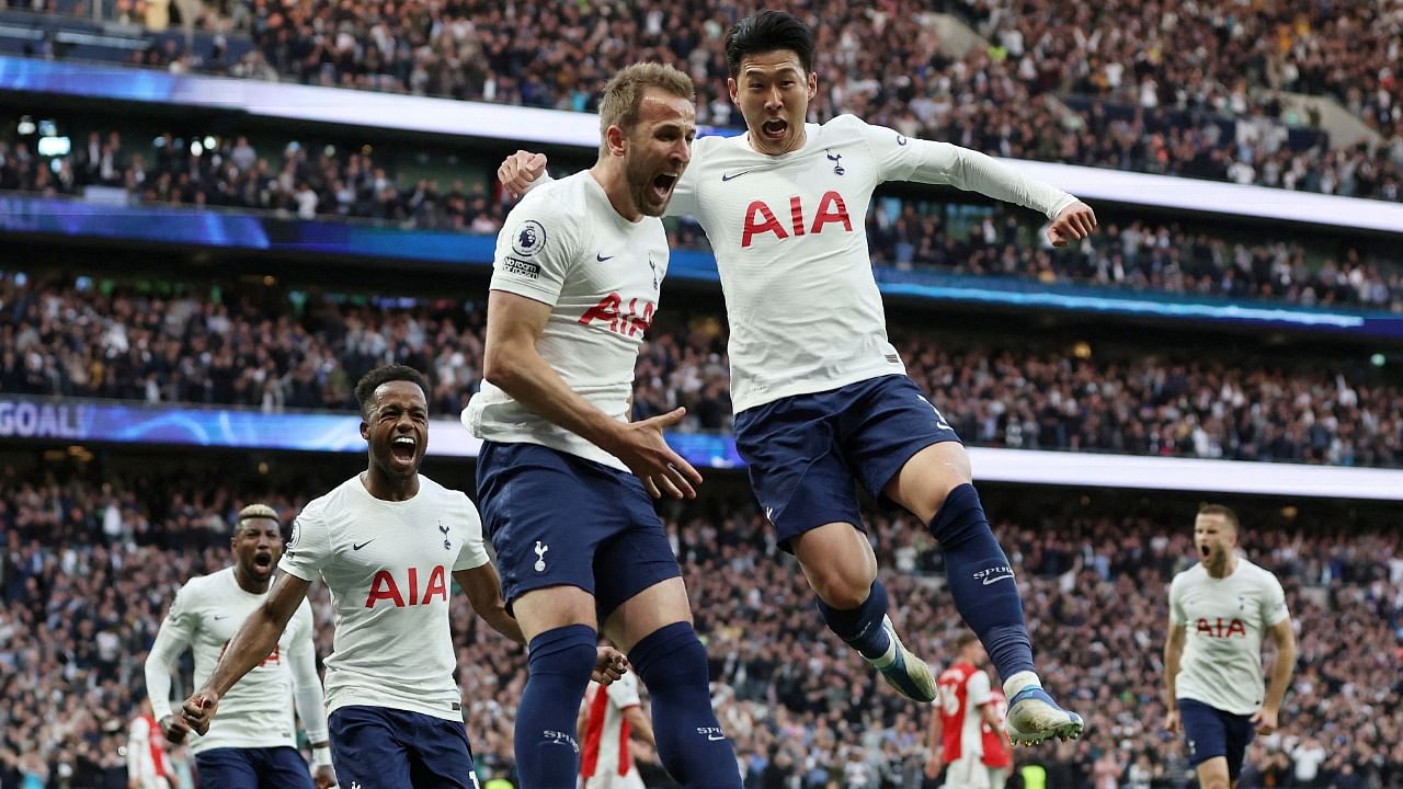 Tottenham Hotspur's Harry Kane celebrates scoring their first goal with Son Heung-min. Credit: Reuters Photo