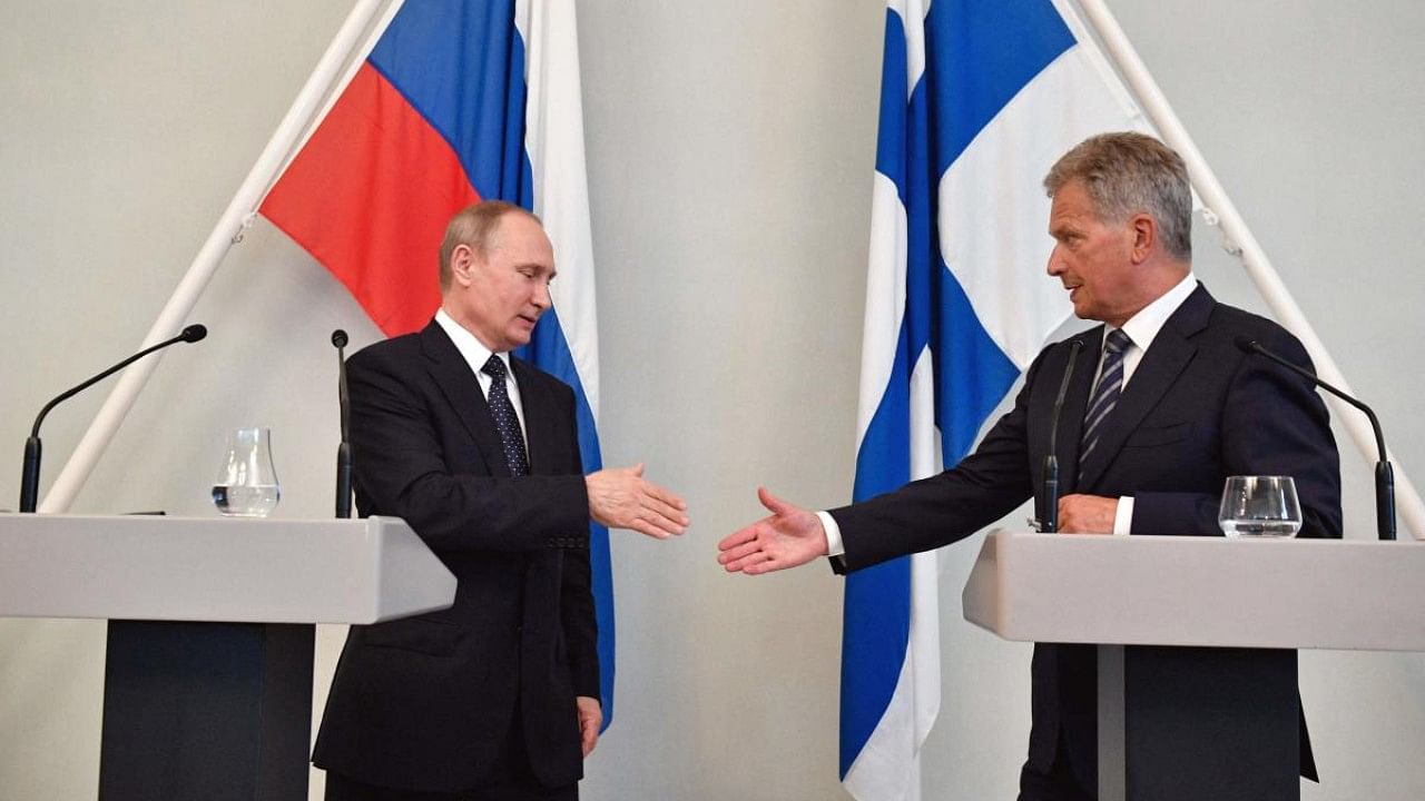 Finland's President Sauli Niinisto (R) and Russian President Vladimir Putin. Credit: AFP File Photo