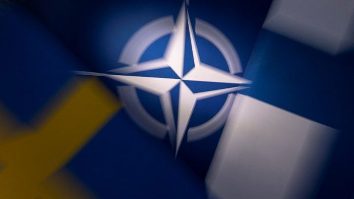 NATO, Swedish and Finnish flags. Credit: Reuters Illustration