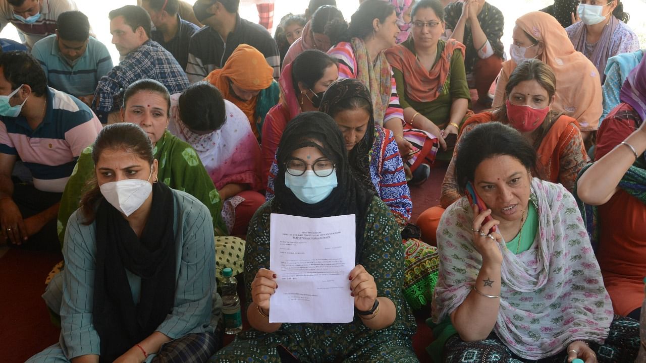  Women from the Kashmiri Pandit community during their sit-in protest against the killing of government employee Rahul Bhat. Credit: PTI Photo
