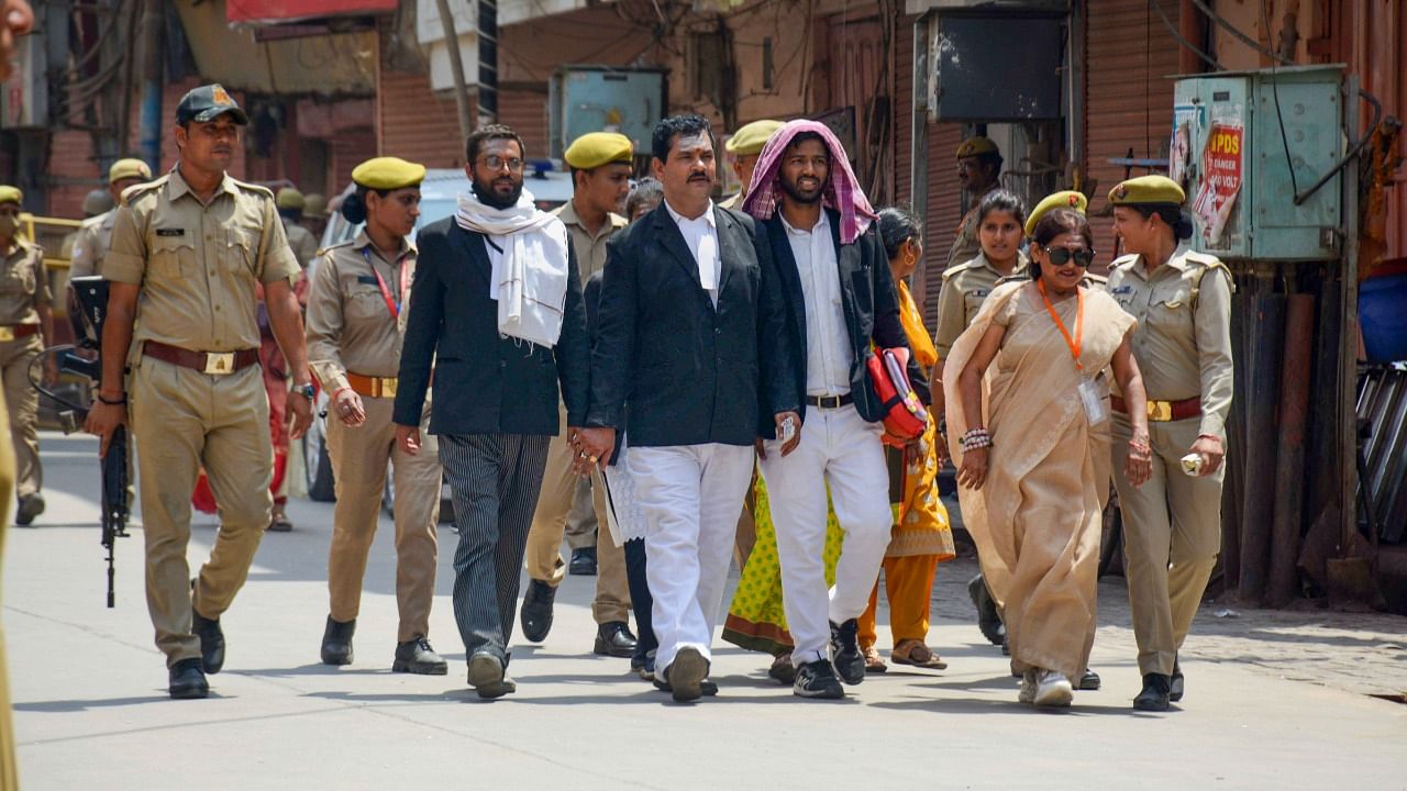 Officials leave after a videographic survey at Gyanvapi Masjid complex, in Varanasi. Credit: PTI Photo