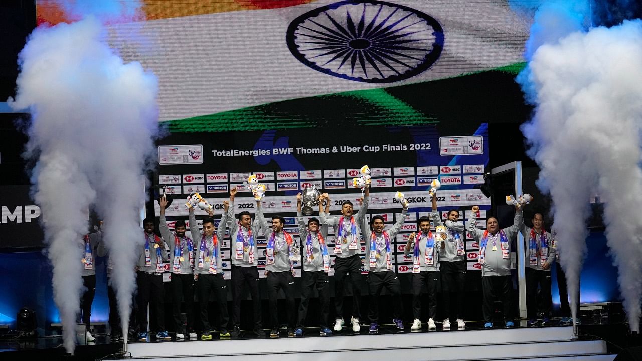 India's team members hold the trophy after winning Thomas Cup title in Bangkok, Thailand. Credit: AP/PTI Photo