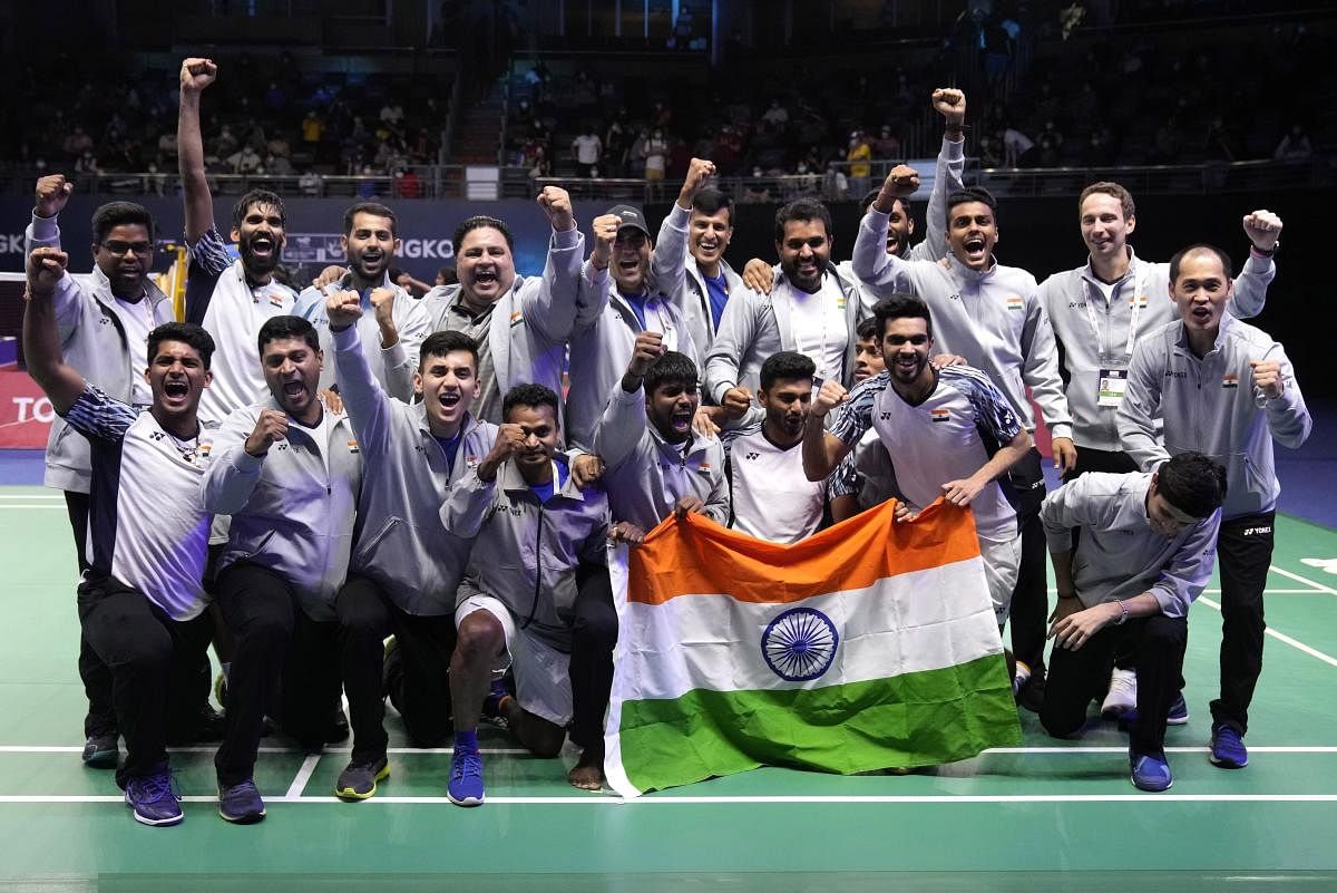 The Indian contingent celebrates after winning the Thomas Cup title in Bangkok on Sunday. Credit: PTI Photo