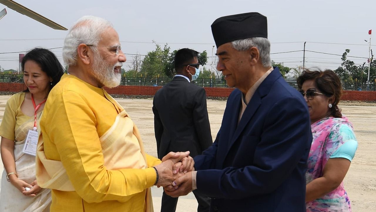 Prime Minister Narendra Modi and Nepalese counterpart Sher Bahadur Deuba. Credit: Twitter.@narendramodi