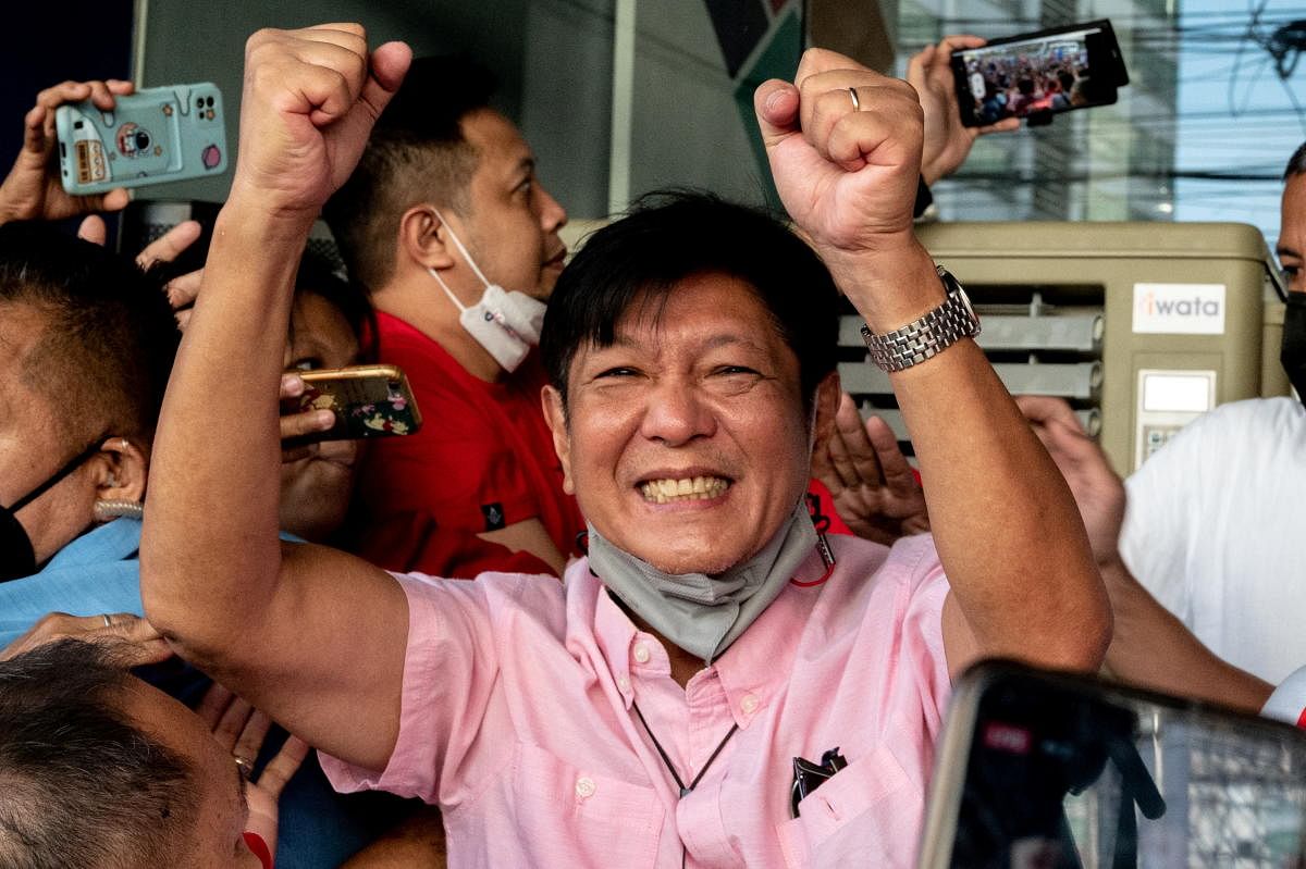 Philippine presidential candidate Ferdinand "Bongbong" Marcos Jr., son of late dictator Ferdinand Marcos, greets his supporters at his headquarters in Mandaluyong City, Metro Manila, Philippines. Credit: Reuters Photo